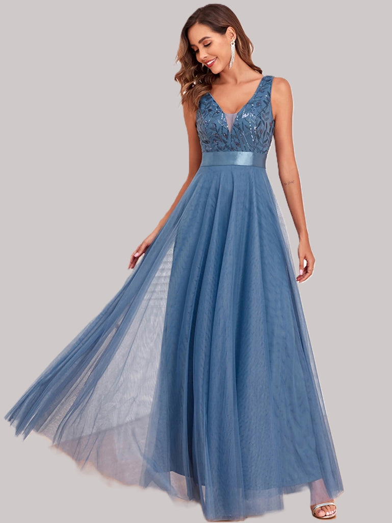 Mesh perfectionist backless prom maxi dress, available in blue and pink, ideal for formal occasions.