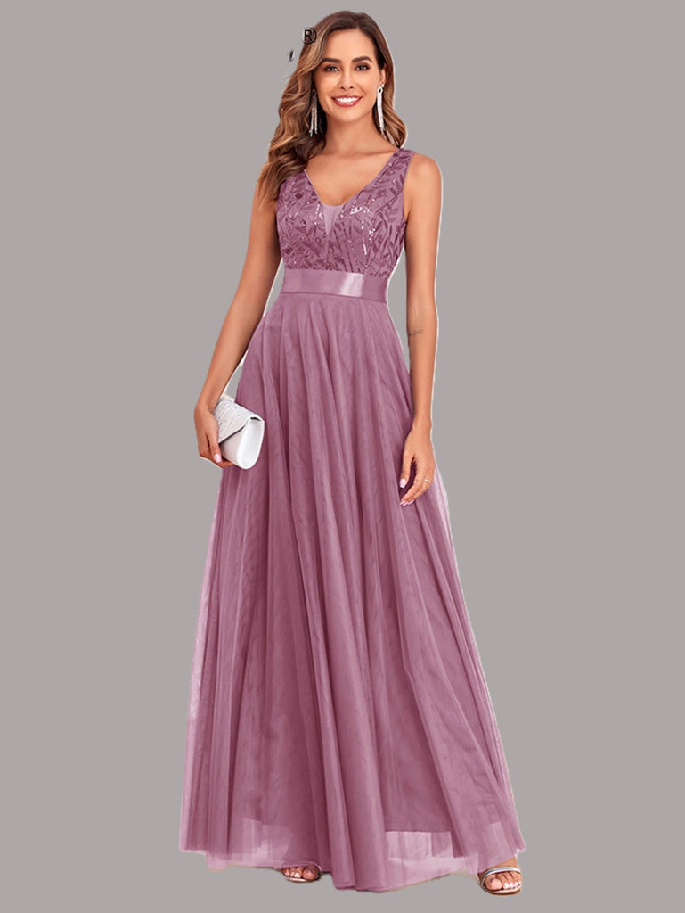 Mesh perfectionist backless prom maxi dress, available in blue and pink, ideal for formal occasions.