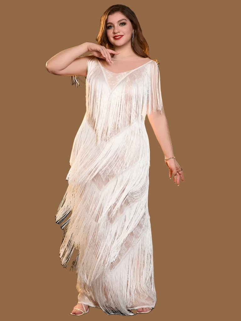 White plus size sequin mini dress with a V-neckline, fringe details, sleeveless design, and back zipper closure.