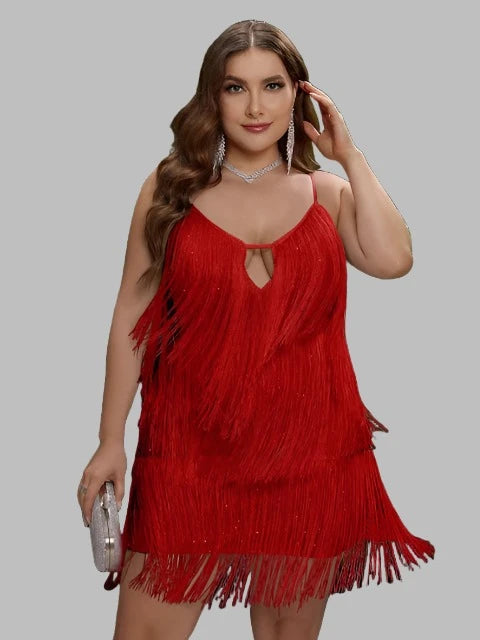 Plus size backless sequin mini dress with fringe details, spaghetti straps, and cutout design, available in multiple colors.