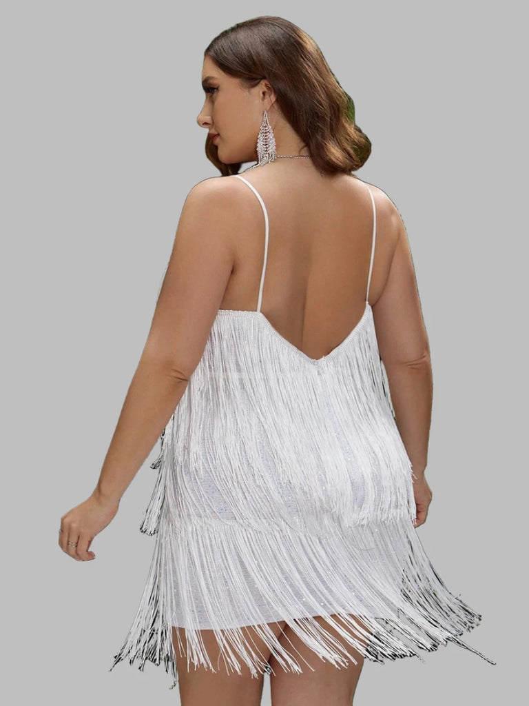 Plus size backless sequin mini dress with fringe details, spaghetti straps, and cutout design, available in multiple colors.