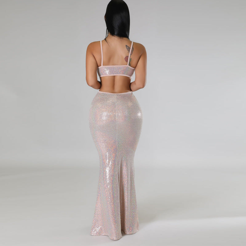 Pink sequin maxi dress featuring a V-neckline, spaghetti straps, and stylish cutout detail, perfect for formal occasions.