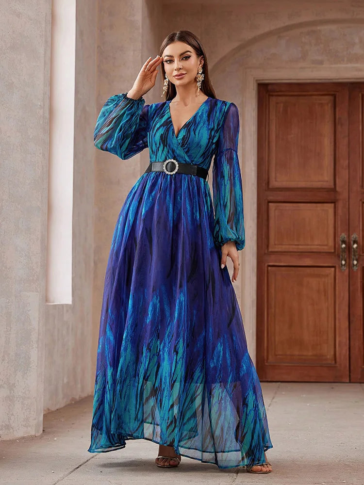 V-neck mesh maxi dress with long sleeves, belted waist, and a flowing design, perfect for formal events, available in blue.