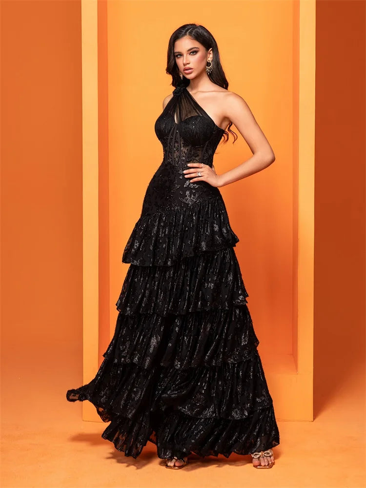 Black skew-shouldered sequin mermaid evening dress with a slit, perfect for formal events and parties.