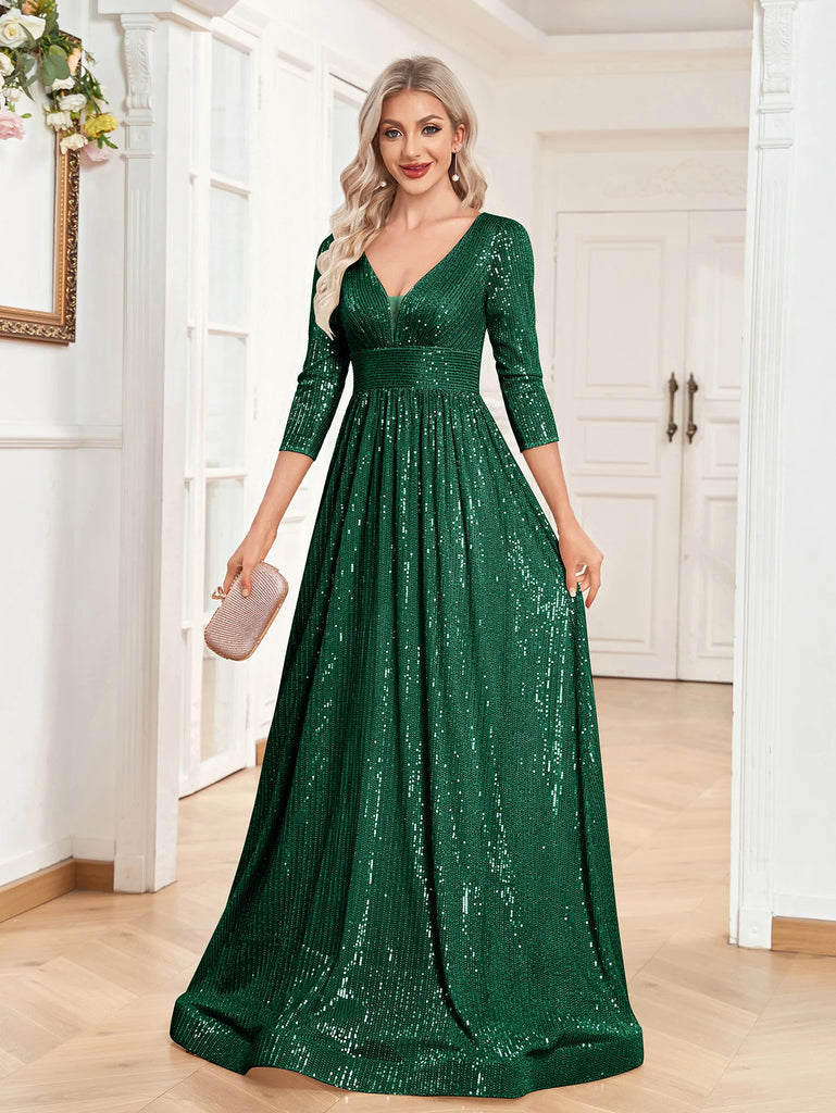 An elegant green sequin gown with a deep V-neckline, 3/4 sleeves, and a flowing A-line silhouette is perfect for evening galas or formal occasions.