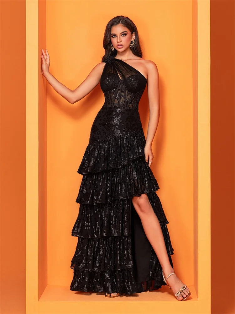 Black skew-shouldered sequin mermaid evening dress with a slit, perfect for formal events and parties.