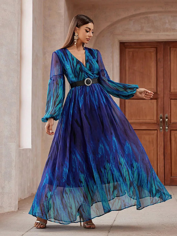 V-neck mesh maxi dress with long sleeves, belted waist, and a flowing design, perfect for formal events, available in blue.