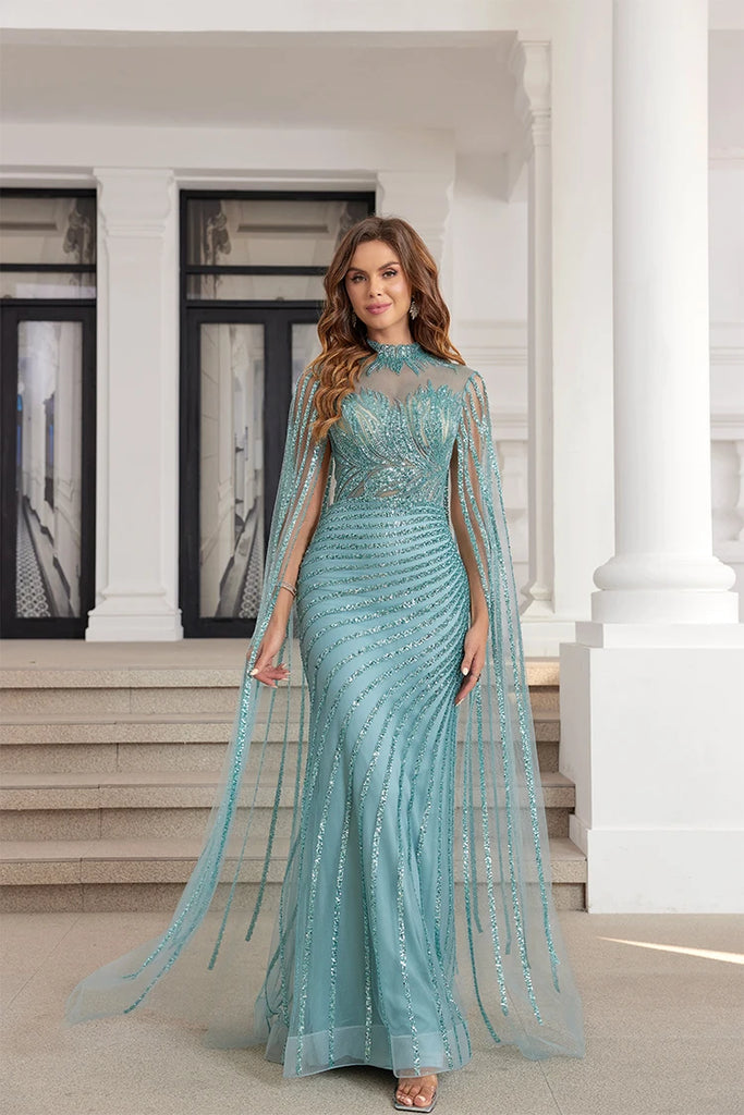 Beaded mint mermaid evening dress with a cape, perfect for prom and formal events.