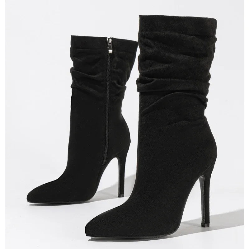 Black, apricot, and red ankle boots with stiletto high heels and pointed toes, perfect for formal occasions.