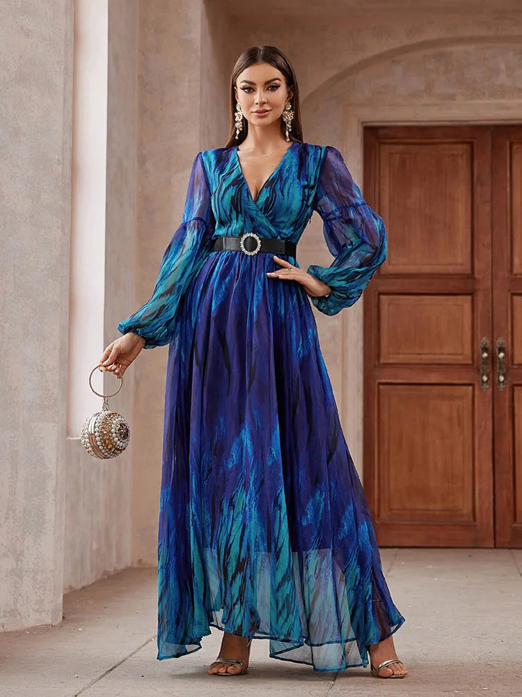 V-neck mesh maxi dress with long sleeves, belted waist, and a flowing design, perfect for formal events, available in blue.