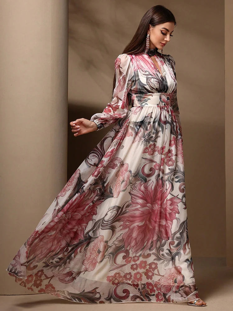 High-waist floral print maxi dress with tie-back detailing and long sleeves, ideal for formal or casual summer wear.