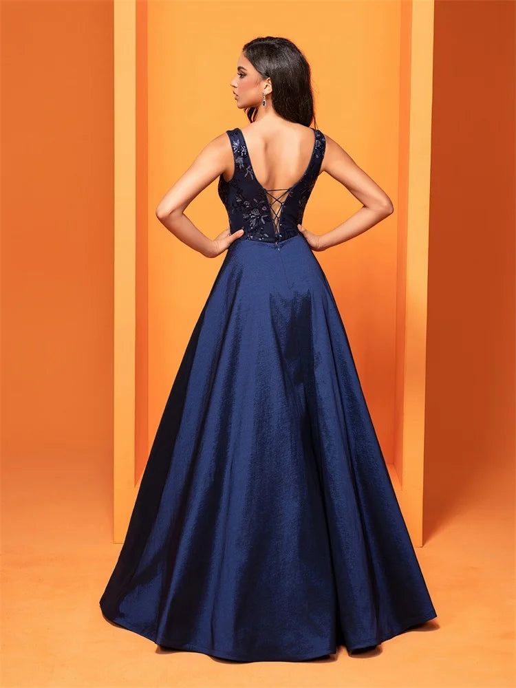 Elegant navy blue satin evening dress with sequins and a deep V-neck, perfect for formal occasions.