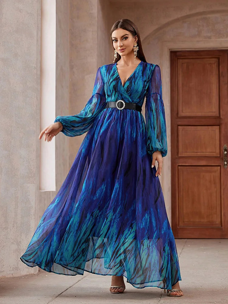 V-neck mesh maxi dress with long sleeves, belted waist, and a flowing design, perfect for formal events, available in blue.