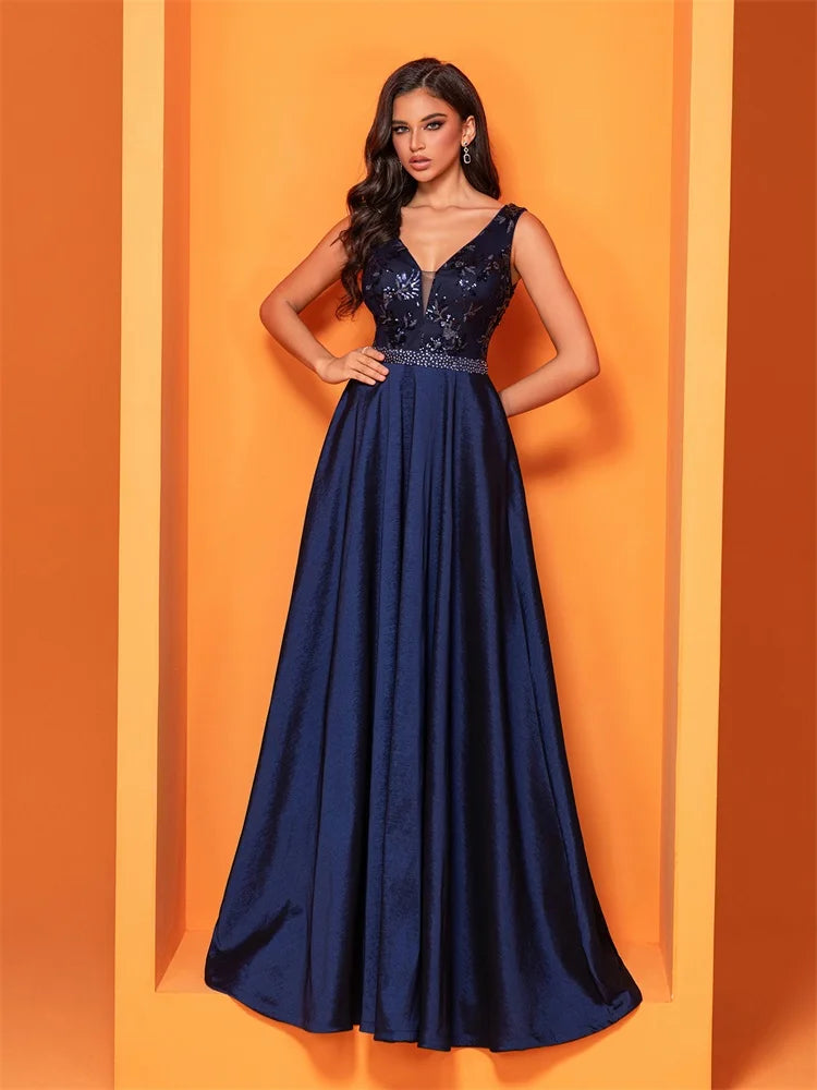 Elegant navy blue satin evening dress with sequins and a deep V-neck, perfect for formal occasions.