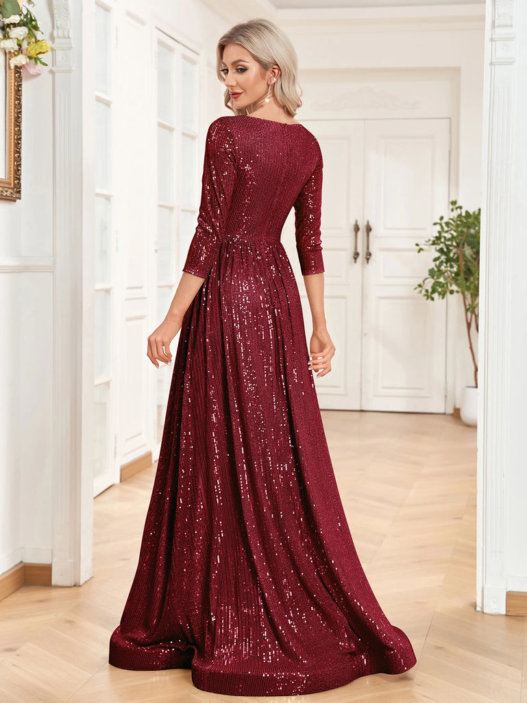 An elegant burgundy sequin gown with a deep V-neckline, 3/4 sleeves, and a flowing A-line silhouette is perfect for evening galas or formal occasions.