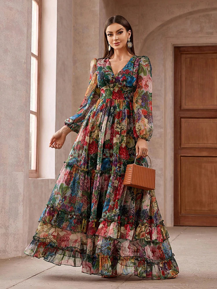 Elegant long-sleeve boho maxi dress with a floral print and frill trim, perfect for casual and vacation wear.