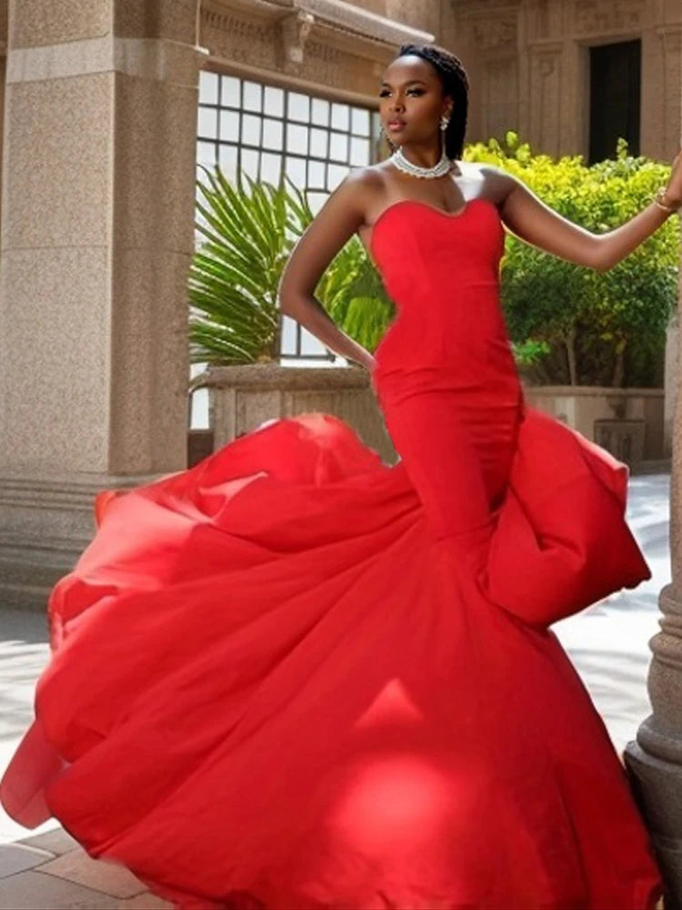 Strapless split floor-length mermaid prom dress, available in red and black, perfect for evening parties and formal events.