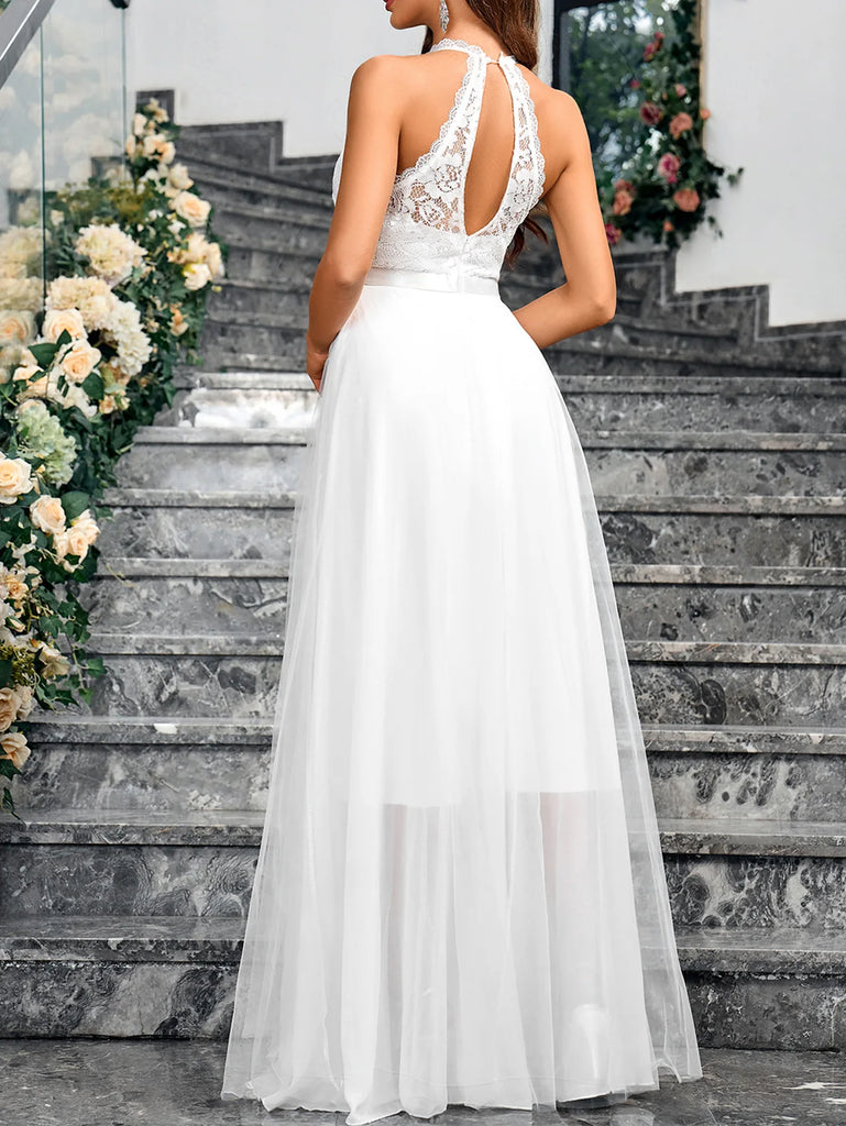 Chiffon halter neck beach wedding dress with lace applique details, available in white.