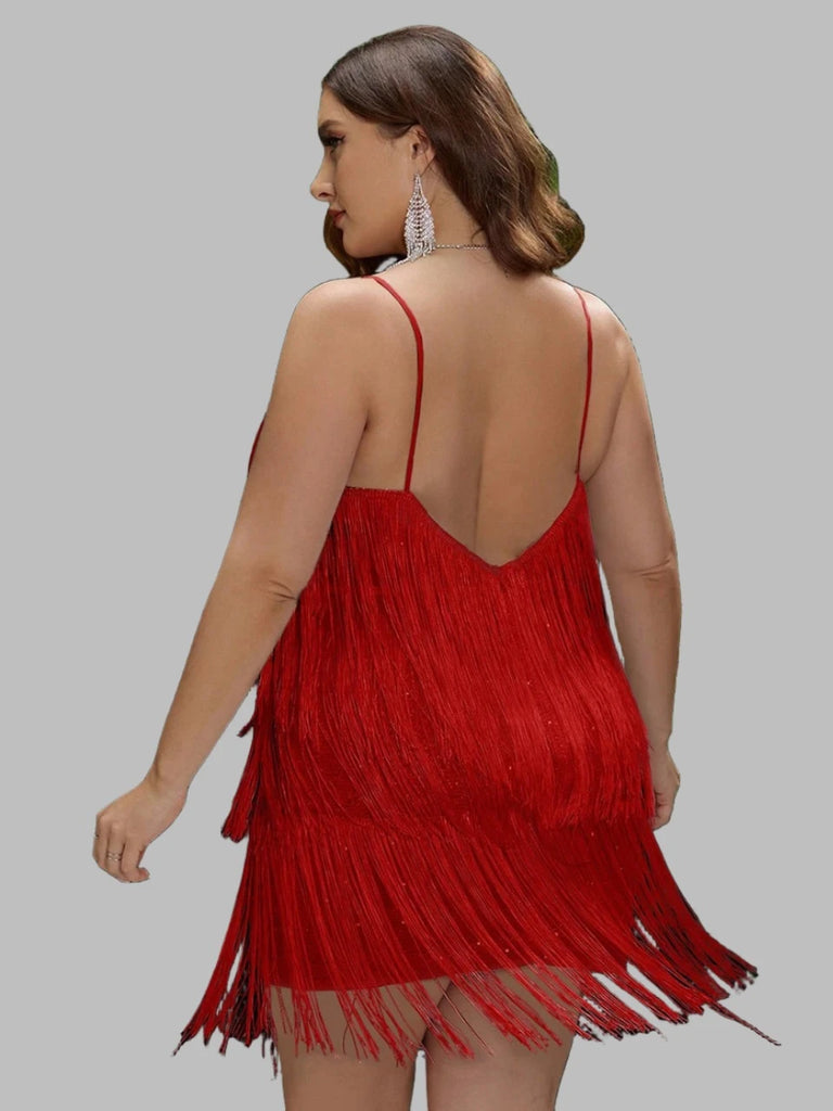 Plus size backless sequin mini dress with fringe details, spaghetti straps, and cutout design, available in multiple colors.