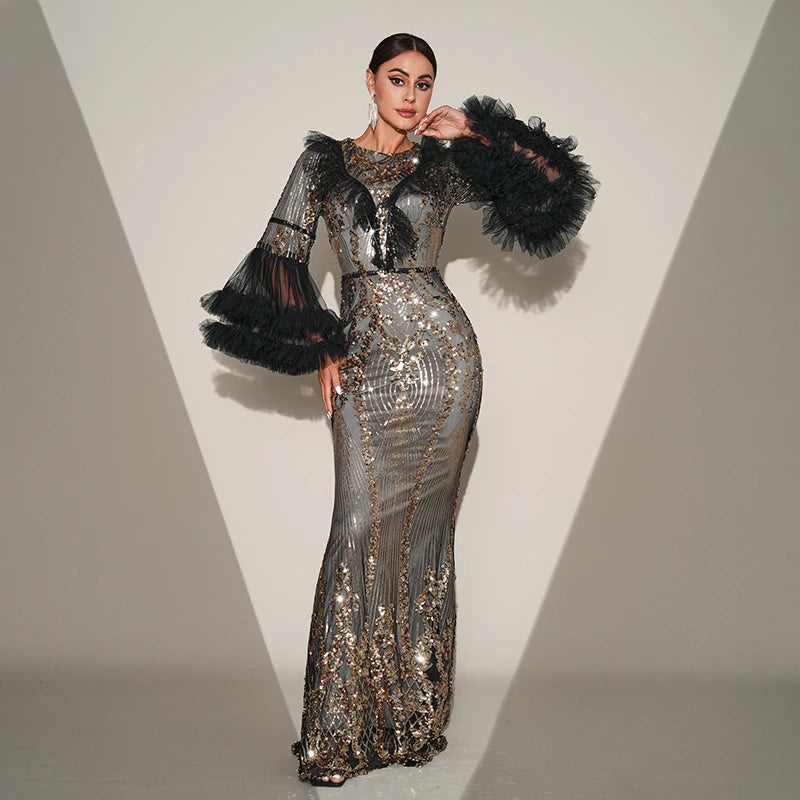 Elegant black maxi dress with sequins, flare sleeves, and a sheer mesh design for formal occasions.