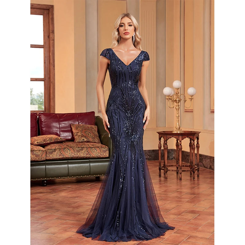 Elegant backless mermaid dress with V-neckline, sequins, and a long flowing hemline, perfect for formal events.