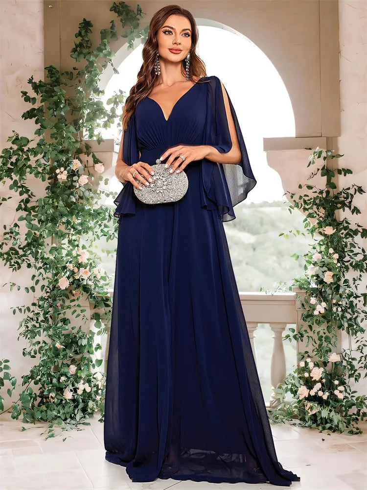 Chiffon long sleeve evening dress with a high slit, available in navy and royal blue.