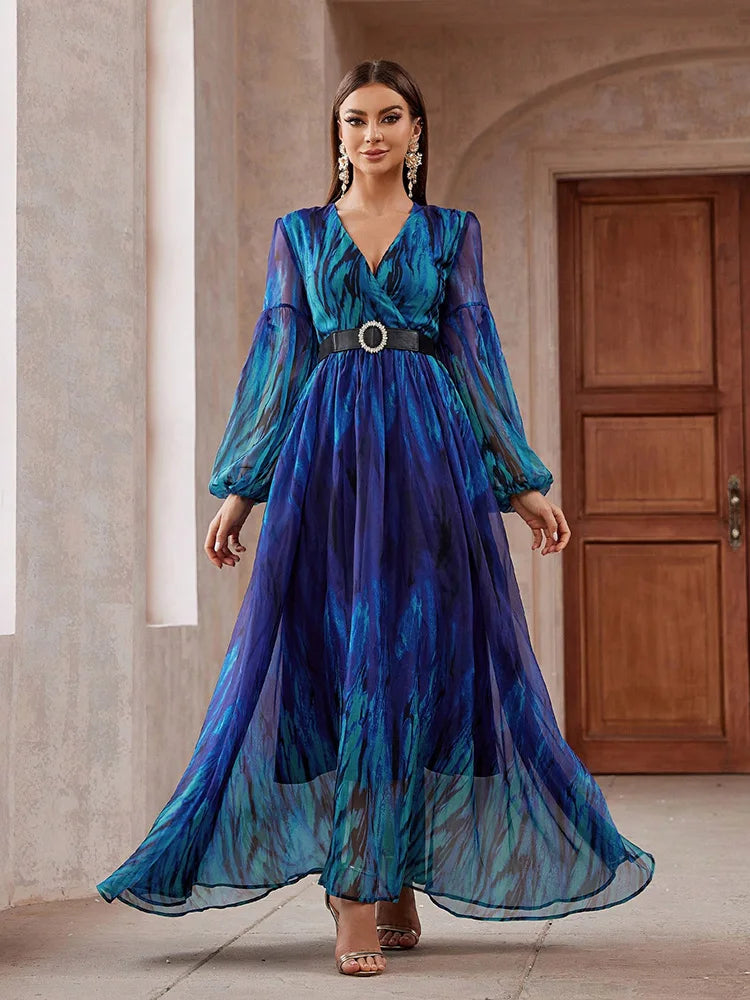 V-neck mesh maxi dress with long sleeves, belted waist, and a flowing design, perfect for formal events, available in blue.