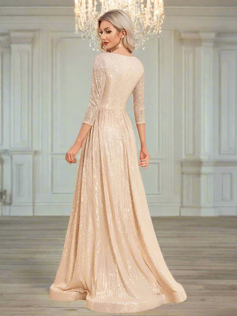 An elegant Champagne sequin gown with a deep V-neckline, 3/4 sleeves, and a flowing A-line silhouette is perfect for evening galas or formal occasions.