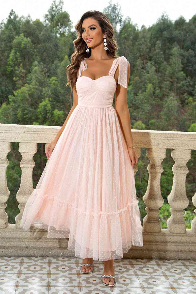 Sweetheart neckline maxi dress in blush pink, floor-length and sleeveless, ideal for formal events.