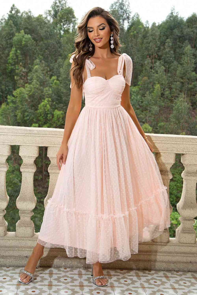 Sweetheart neckline maxi dress in blush pink, floor-length and sleeveless, ideal for formal events.